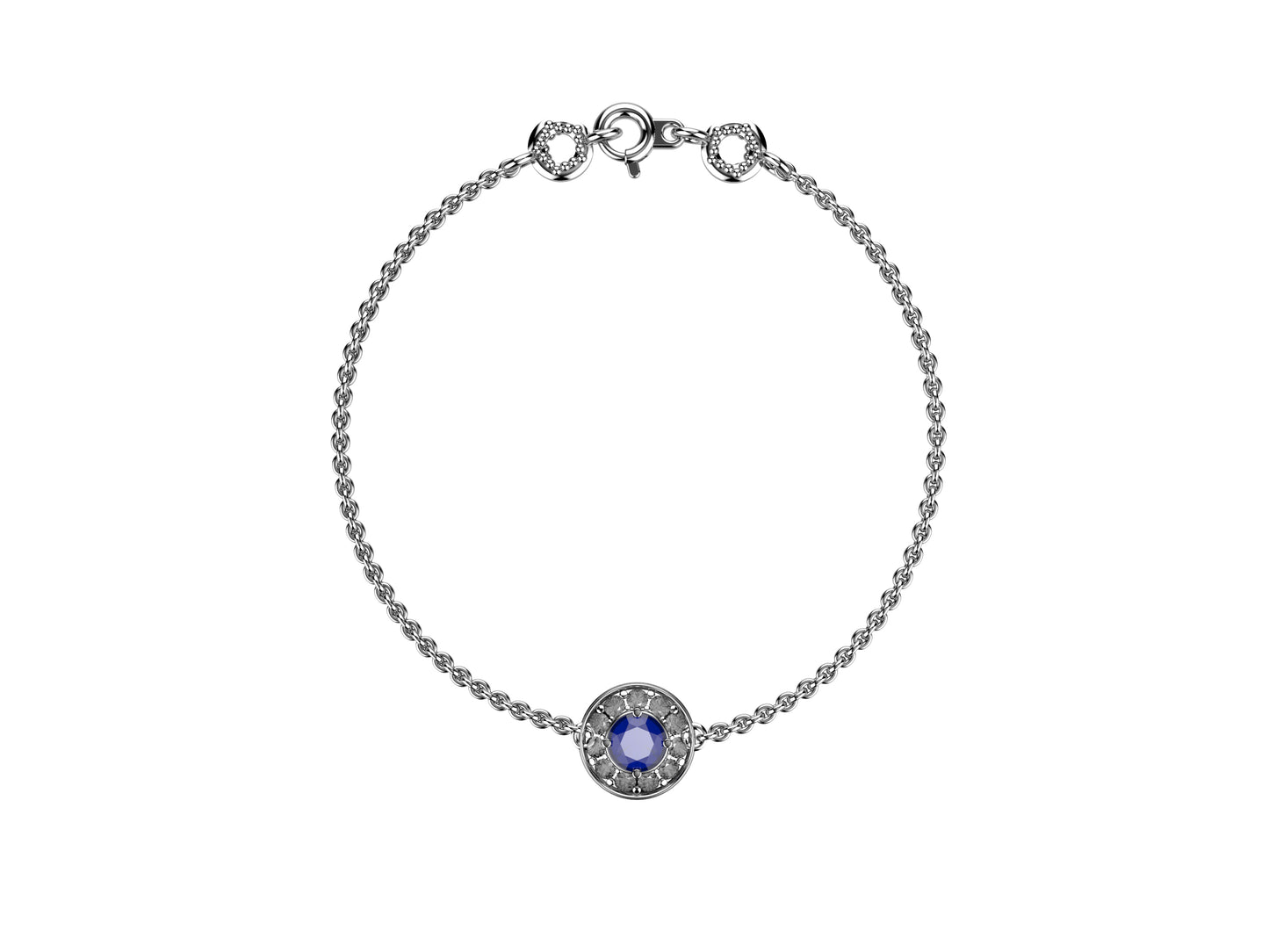 Gemmes De La Divinite bracelet, 18K white gold, set with a blue sapphire and brilliant-cut diamonds around totaling 0.499 carat. Thickness: 1.78 mm. Diameter of the halo: 11,5 mm.