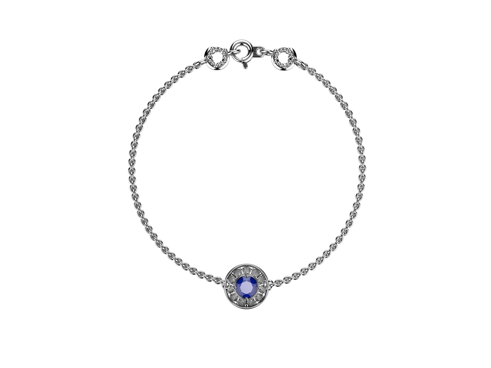 Gemmes De La Divinite bracelet, 18K white gold, set with a blue sapphire and brilliant-cut diamonds around totaling 0.499 carat. Thickness: 1.78 mm. Diameter of the halo: 11,5 mm.