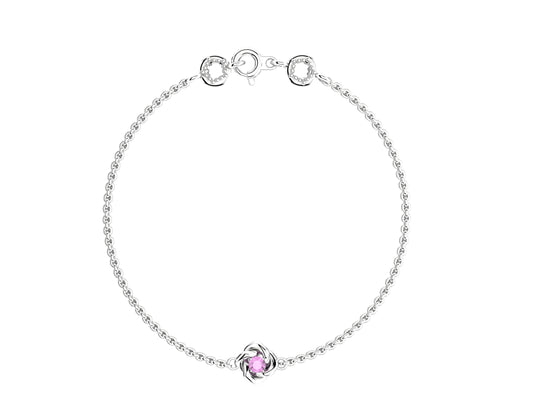 Gemmes De La Divinite bracelet, sterling silver, set with a pink sapphire. Thickness: 1.8 mm. Diameter of the pattern: 8.5 mm.