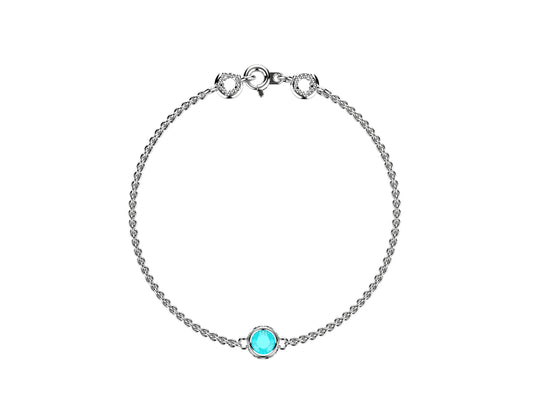 Gemmes De La Divinite bracelet, sterling silver,  aquamarine,set with a brilliant-cut diamond totaling 0.45 carat. Thickness: 1.8 mm. Diameter of the pattern: 8.5 mm.