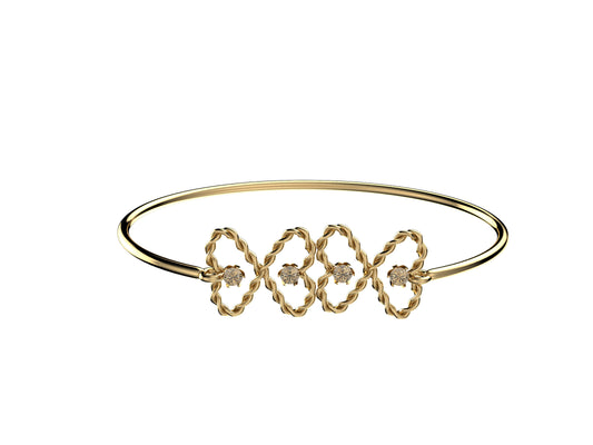 MatiJaro Heart bracelet, 18K yellow gold, set with 4 diamonds totaling 0.4 carat. Width: 3.65 mm.