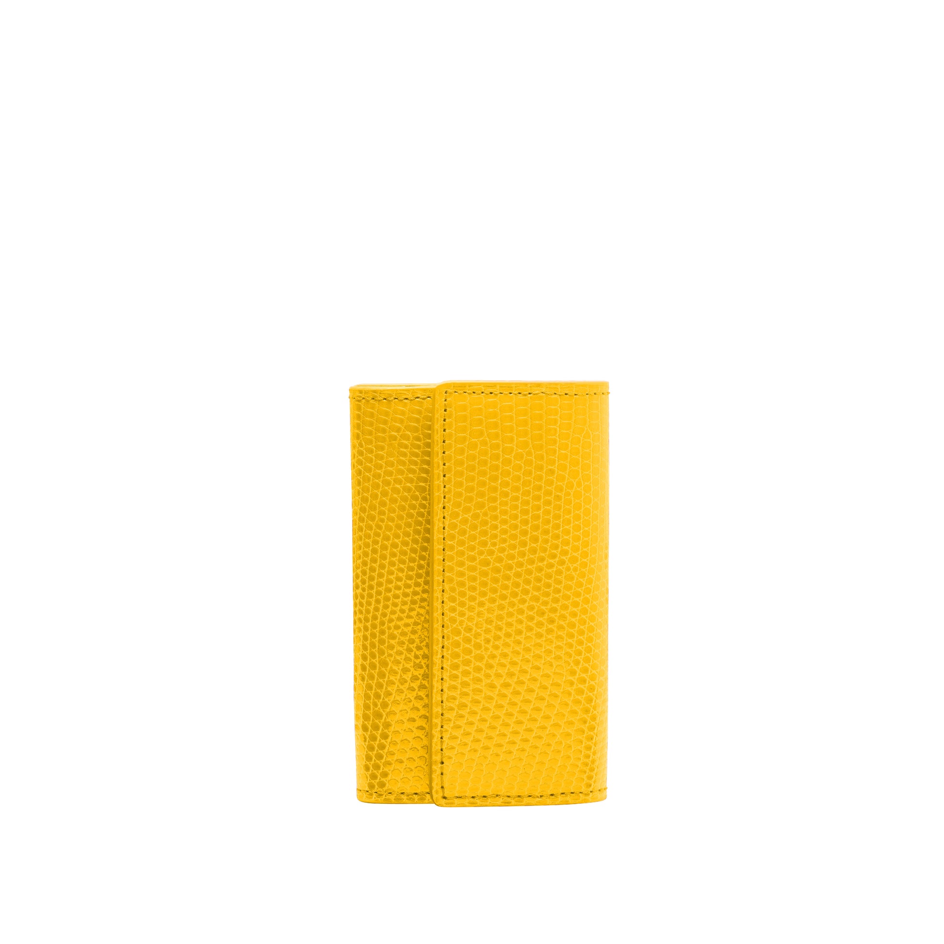 Small keyholder in Yellow shiny lizard leather. Six internal key holders and one open compartment inside. Flap closure with clip.